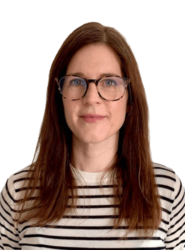 A photo of Brooke who has medium length brown hair and is wearing glasses with a stripy top.
