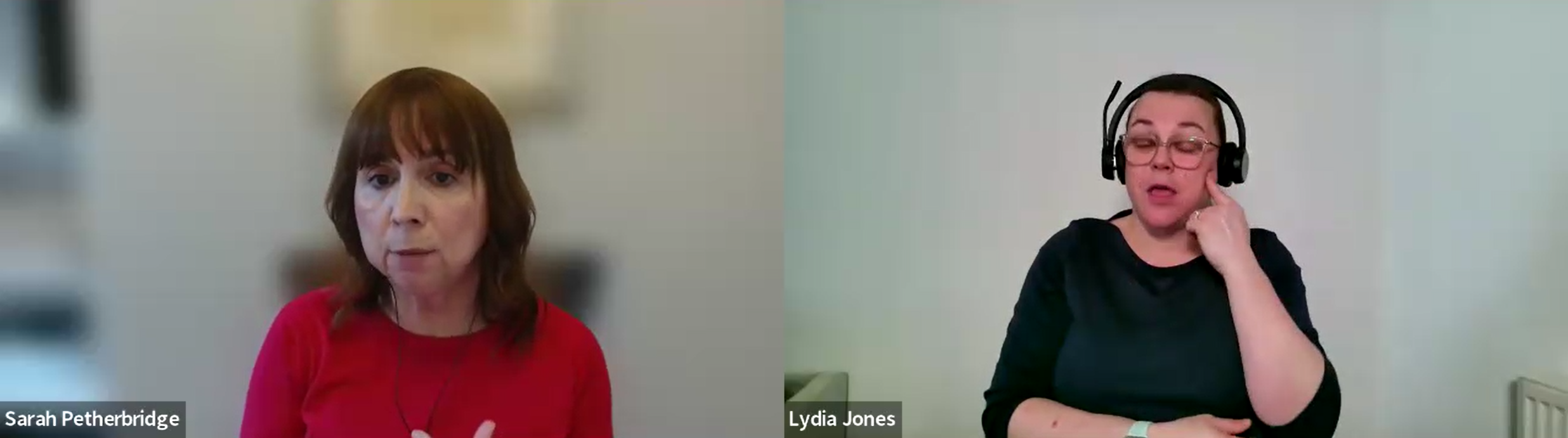 Sarah Petherbridge is wearing a red jumper during the webinar and joined on screen by BSL interpreter Lydia Jones.